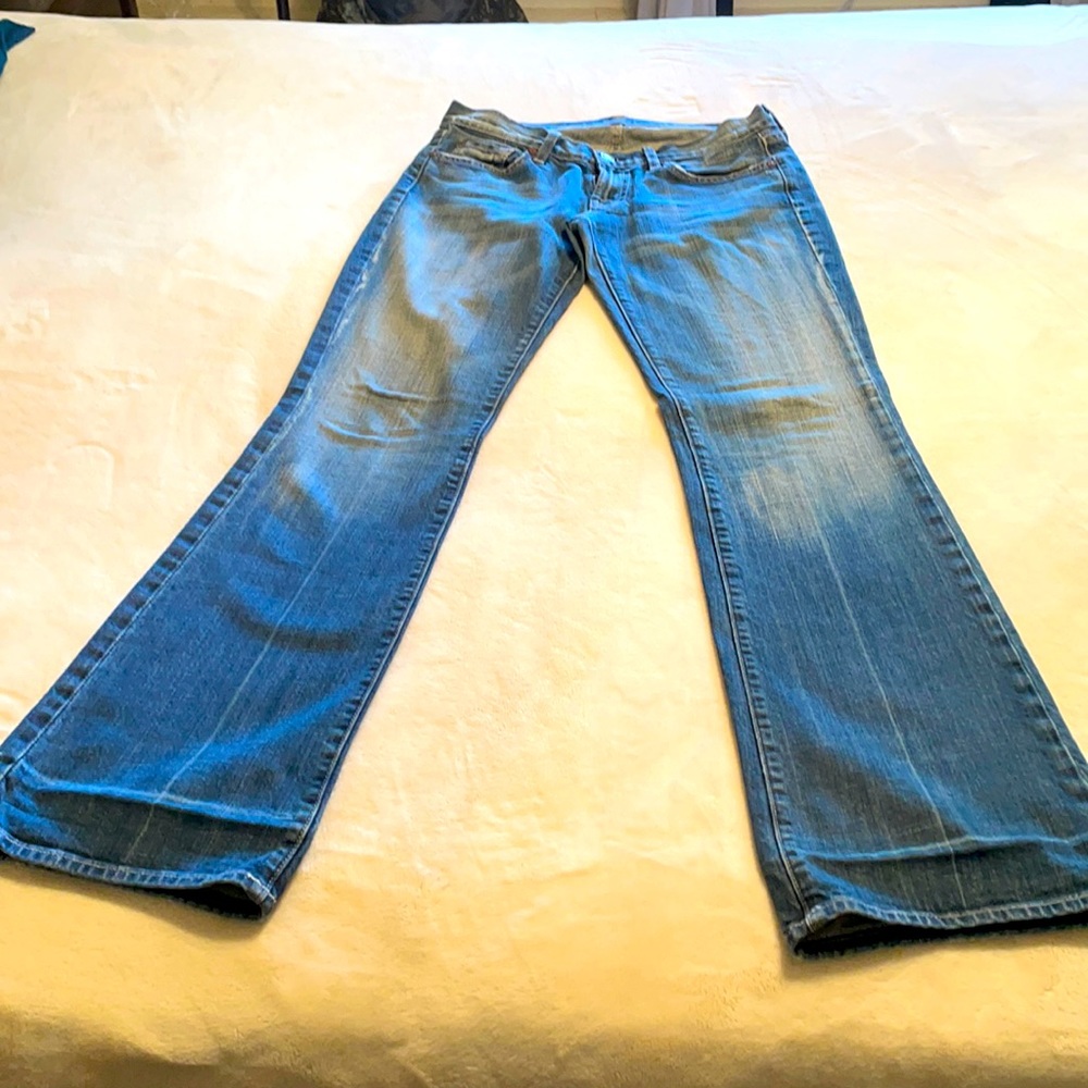 Size 28- medium blue, boot cut jeans.